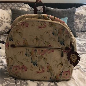 Parrot and floral backpack